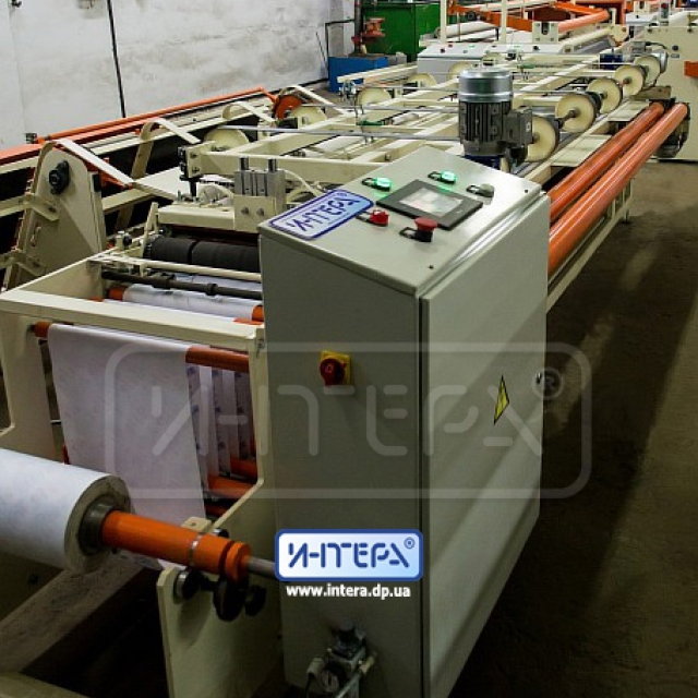 Toilet paper logs wrapping machine